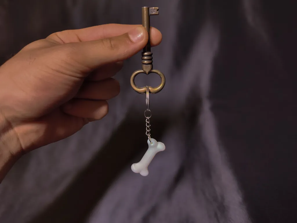 porte clé os argenté.webp